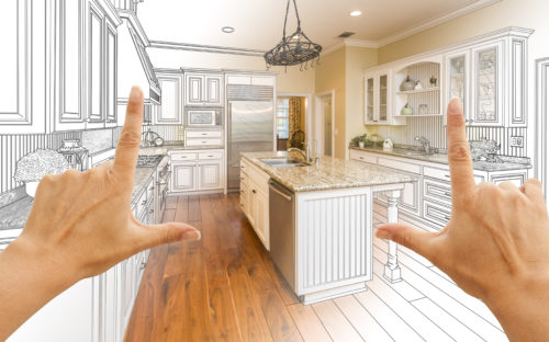 Female Hands Framing Gradated Custom Kitchen Design Drawing and Photo Combination.